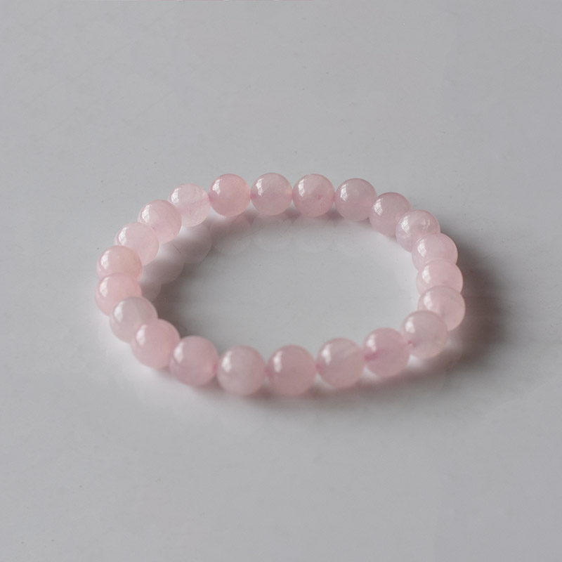 8mm Pink Stone Bracelet—natural pastel pink beads, smooth polish, ideal for stacking and daily wear.