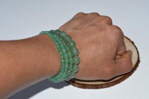 Green Stone Bracelet worn on wrist, showing natural Green Aventurine beads in everyday style