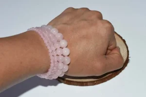 Pink Stone Bracelet on hand—real wrist fit and bead size reference in natural light.