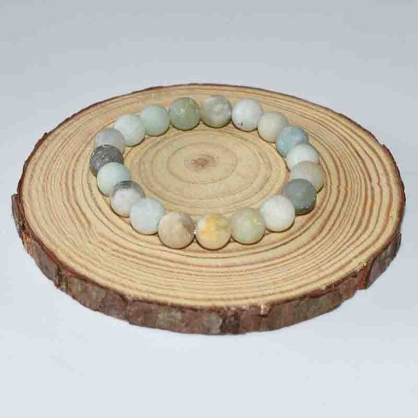 Matte Amazonite Bracelet displayed on wooden base – 10mm natural gemstone beads