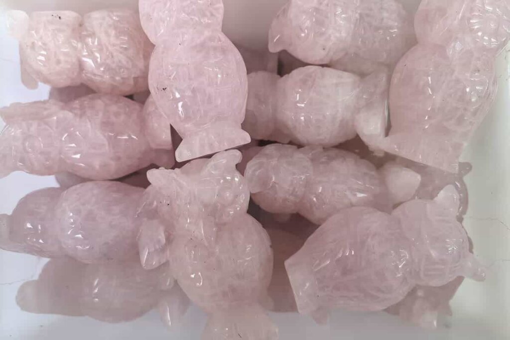 ose Quartz Carved Owl symbol of wisdom and protection, connected to rose quartz benefits for spiritual growth