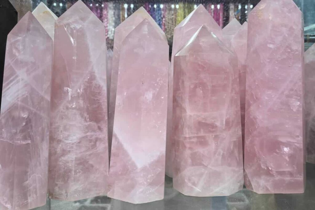Rose Quartz Tower crystal used in meditation and home decor, amplifying rose quartz benefits for peace and balance