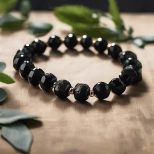 Experience black tourmaline bracelet benefits through this handcrafted piece placed on a calming natural backdrop.