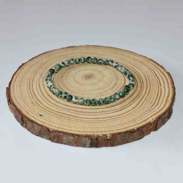 Circular Green Spot Jasper bracelet with uniform bead alignment