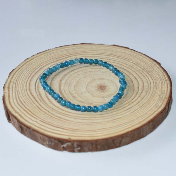 Stretch Blue Apatite Bracelet wrapped in spiral form, showcasing fine blue apatite bead quality