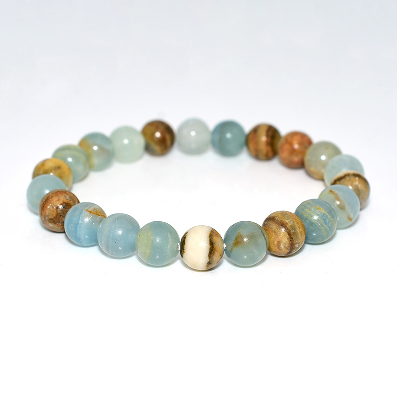 Minimalist photo of Blue Calcite Bracelet highlighting soft blue hues