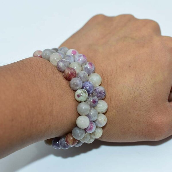 Wrist wearing Pink Tourmaline Bracelet, natural 8mm gemstone beads