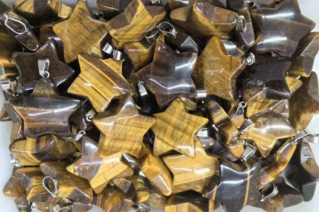 Tiger Eye Beads Meaning shown in star-shaped pendants symbolizing protection and focus