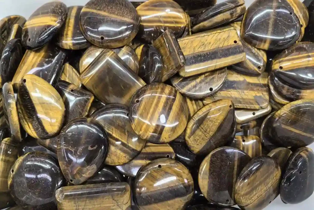 Tiger Eye Beads Meaning with polished gemstone cabochons for courage and balance