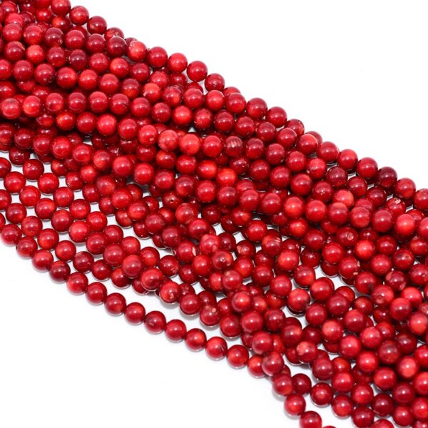 Bright red coral gemstone beads in uniform round shapes