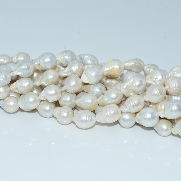 Naturally tangled baroque pearl beads showcasing organic form and shine