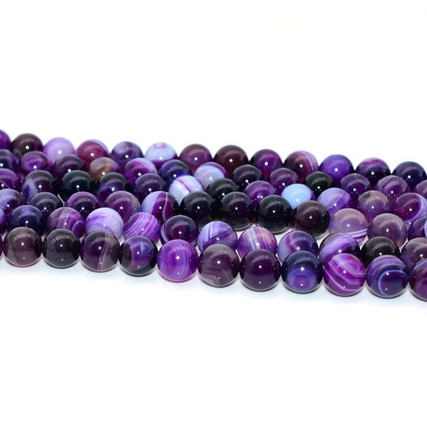 purple agate beads arranged neatly