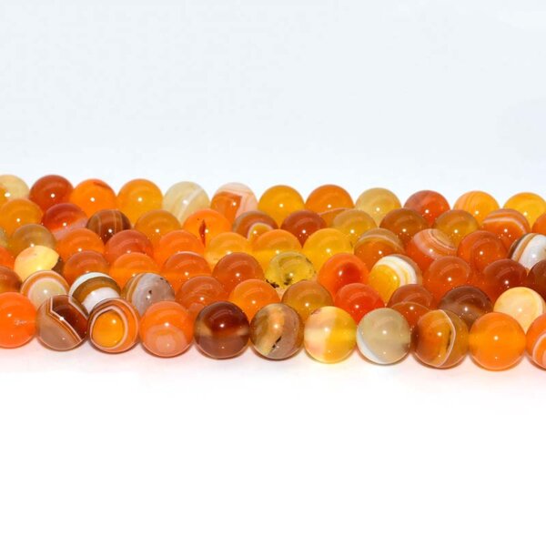 orange beads arranged neatly