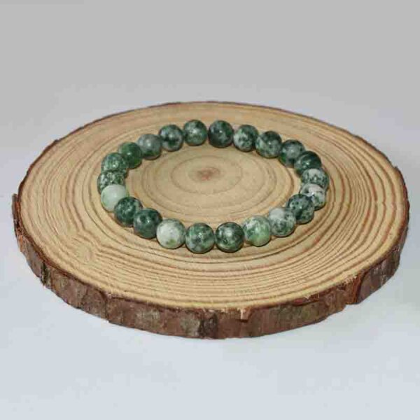 Green Spot Jasper gemstone bracelet laid flat for detail view