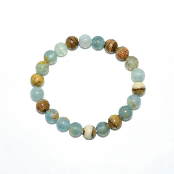 Close-up of Blue Calcite gemstone beads showing blue and brown color mix