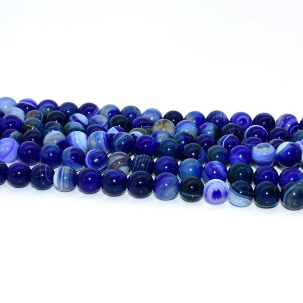 Blue agate beads displayed in a line