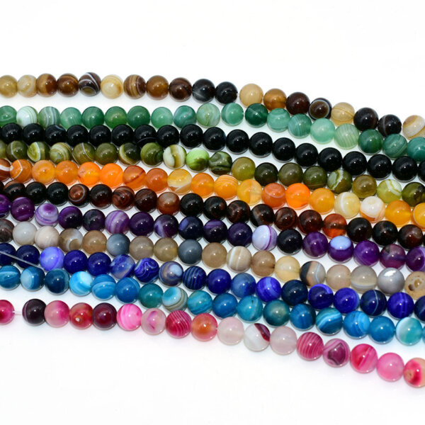 Assorted agate beads in multiple colors including purple, orange, blue, green, and more