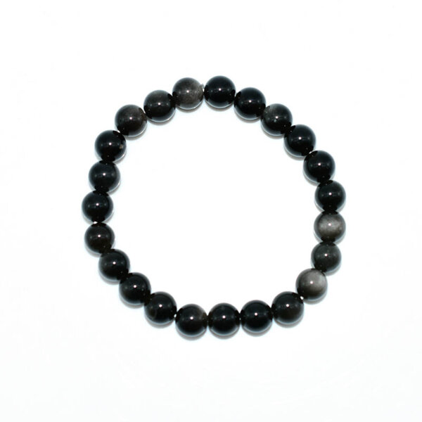 Top view of a Silver Obsidian Bracelet on flat surface, neatly arranged