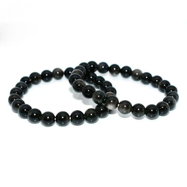 Two Silver Obsidian Bracelets laid out together, emphasizing bead symmetry