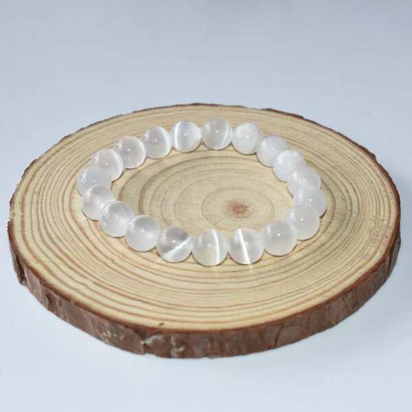 Raw selenite chip bracelet neatly arranged in a spiral