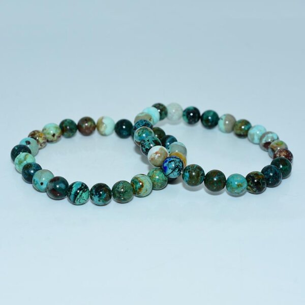 Two Chrysocolla Bracelets displayed side by side on white background