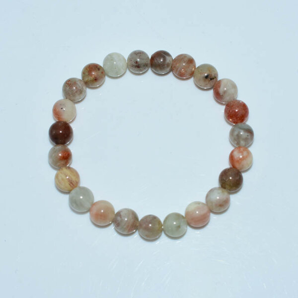 Close-up of Arusha Sunstone Bracelet beads in circular arrangement