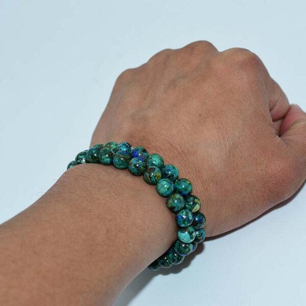 Wrist wearing Azurite Bracelet with deep blue and green gemstone beads
