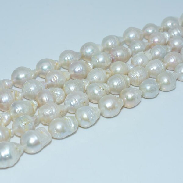 Side view of 13x18mm baroque freshwater pearls with soft white tone