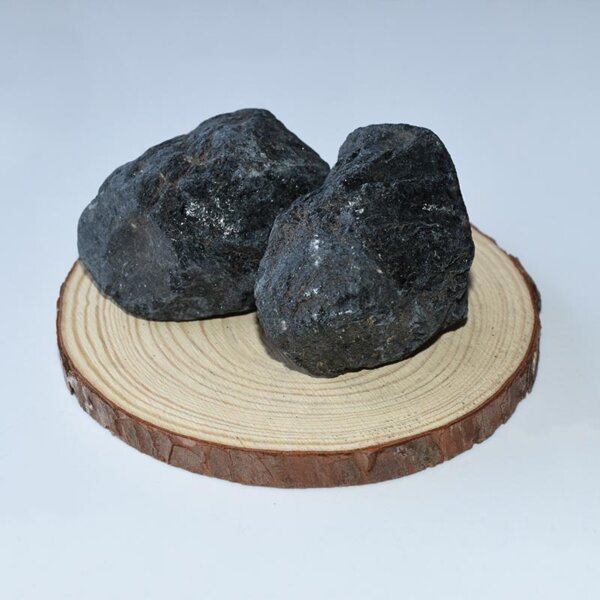 Raw Black Tourmaline stones on a wooden display base 5-7cm