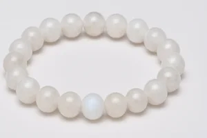 White moonstone bracelet with round beads on white background