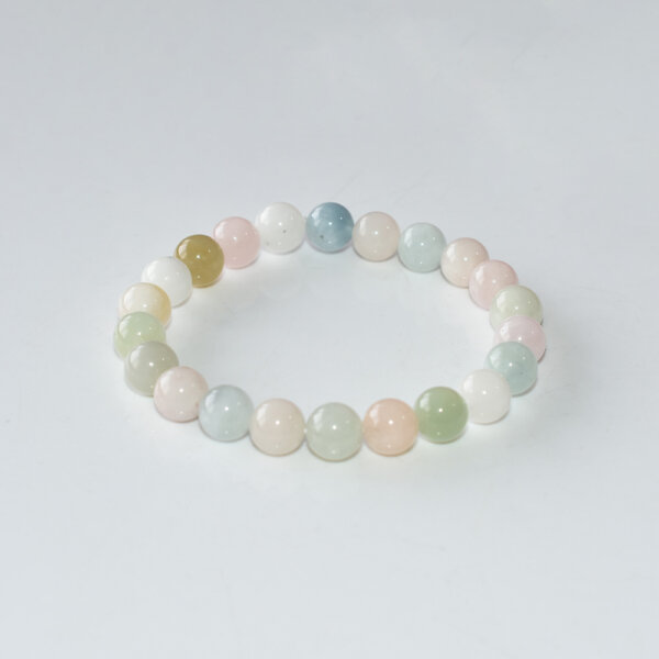 Morganite Crystal Bracelet with soft pink and green natural beads on white background, 8mm round stones, handmade stretch design