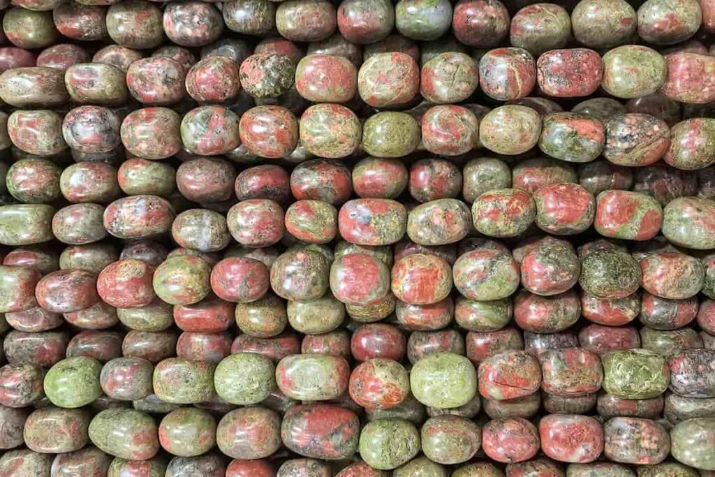 Smooth Unakite Tumbled Stones with blended green and pink colors, reflecting Unakite Meaning of balance, calmness, and heart-centered energy.