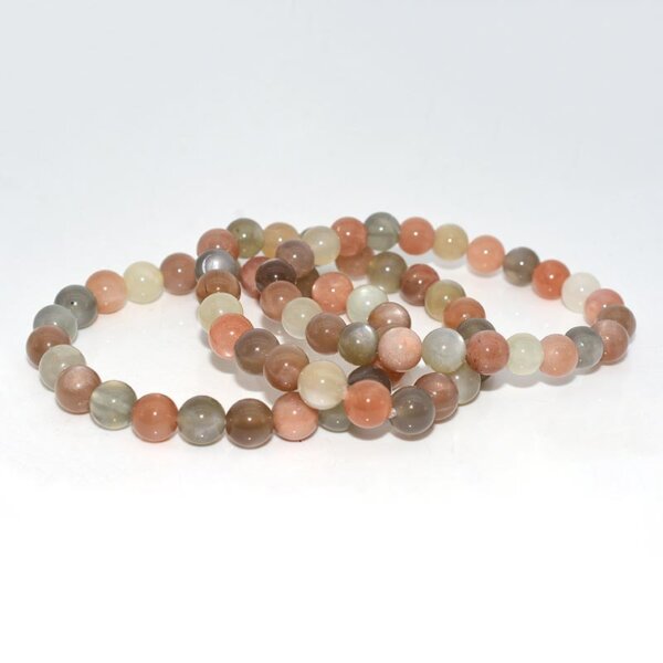 Peach Moonstone Bracelet laid flat to highlight stone texture and bead polish