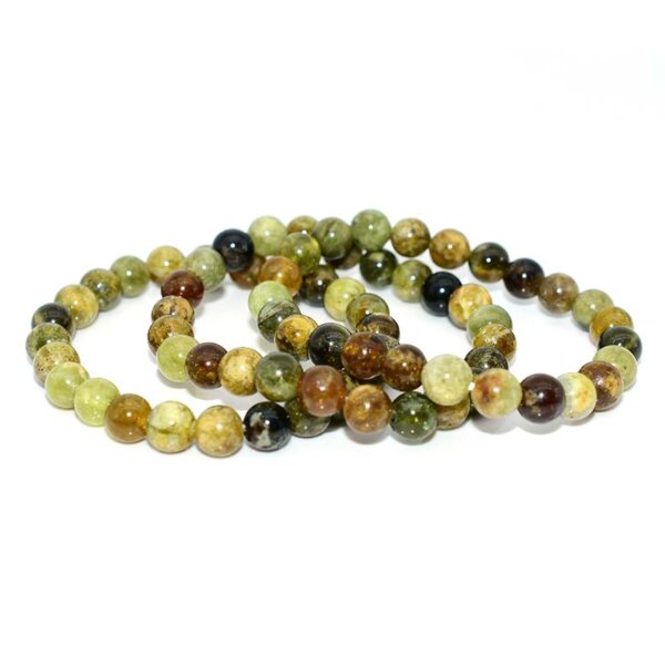 Multiple Green Garnet Bracelets laid out to display bead variations