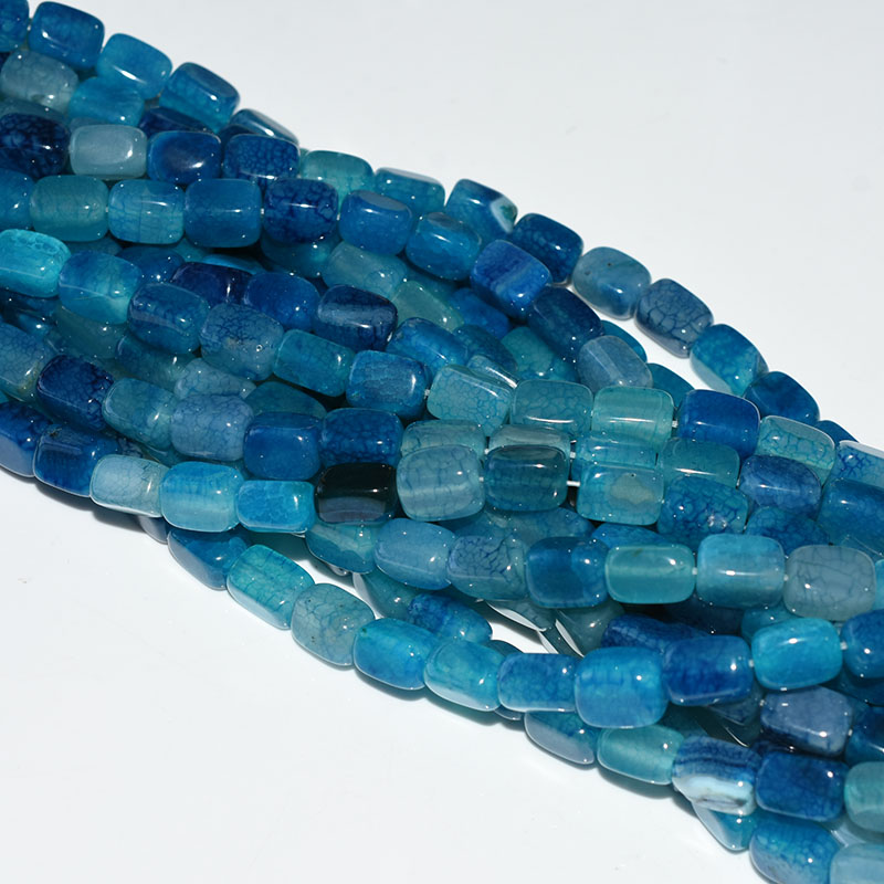 Blue Agate Beads On White Ground