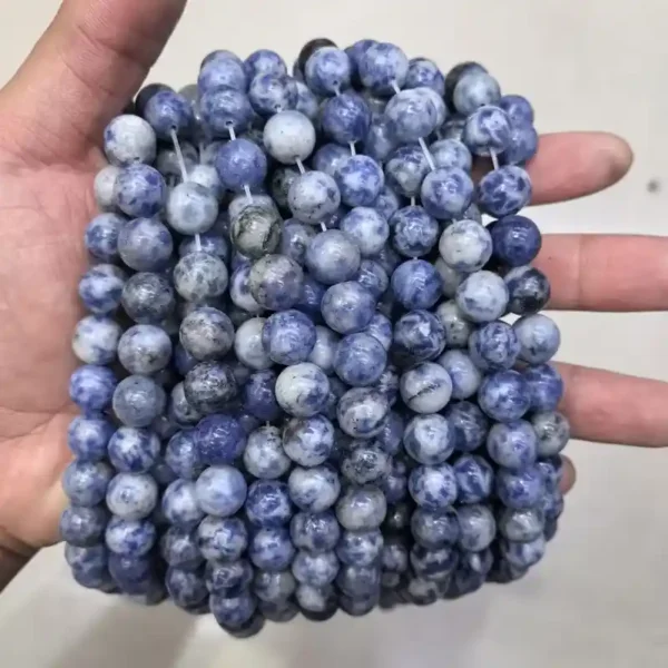 10mm Sodalite Beads in hand – medium-large gemstone beads for bracelets and necklaces