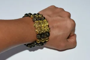 Feng Shui Obsidian Bracelet worn on wrist showing Pixiu charm