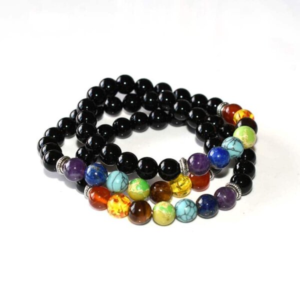 Black Tourmaline Chakra Bracelet laid flat with polished black and chakra beads