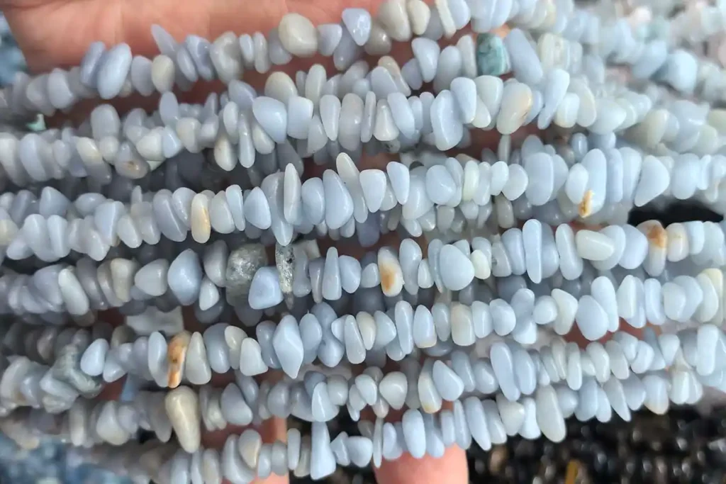 Angelite Stone Meaning – Polished Angelite gemstone chips for energy balance