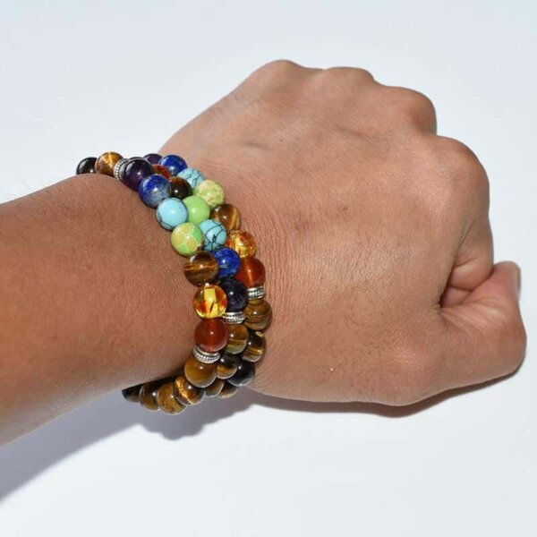 Tiger Eye Chakra Bracelet displayed on hand highlighting chakra alignment