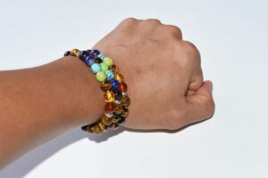 Tiger Eye Chakra Bracelet worn on wrist showing natural golden-brown stones