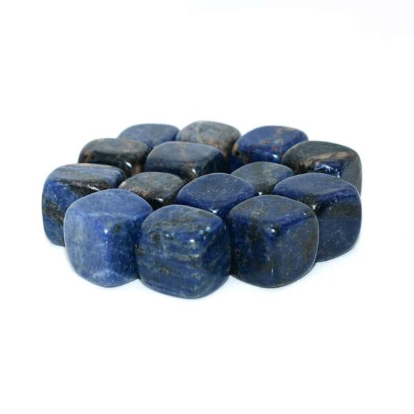 Polished Sodalite Cube stones stacked for display