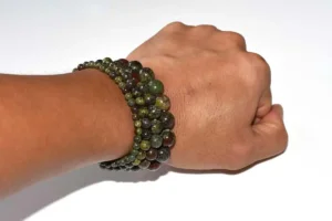 Dragon Blood Jasper Bracelet stacked on wrist multiple bead sizes