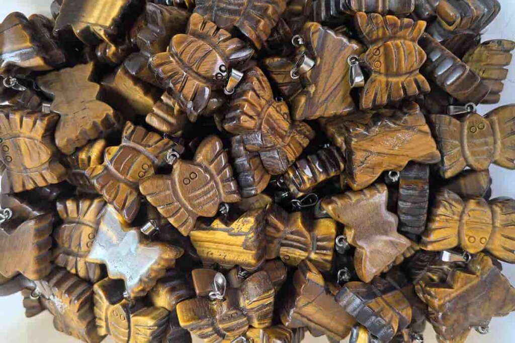Tiger Eye Benefits with tiger eye butterfly representing strength and prosperity