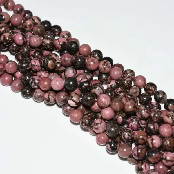 10mm Rhodonite Beads highlighting smooth round cut and vivid pink color