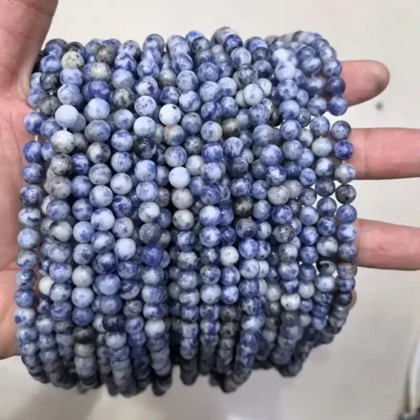 6mm Sodalite Beads in hand – delicate round gemstone beads for fine jewelry making