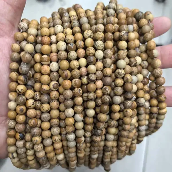 Multiple strands of Picture Jasper Beads stacked together.