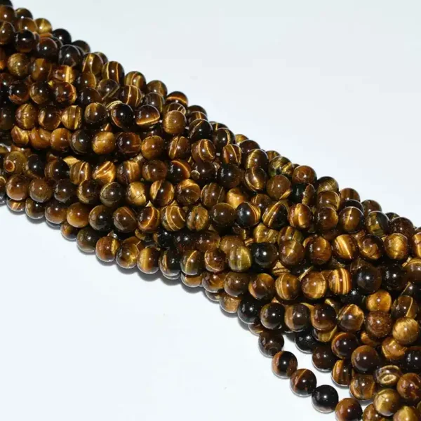 Bundle of Picture Jasper Beads held in hand.