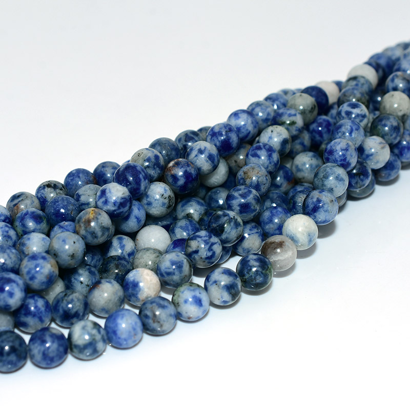 Blue Sodalite Beads strands on white background – genuine gemstone for jewelry making