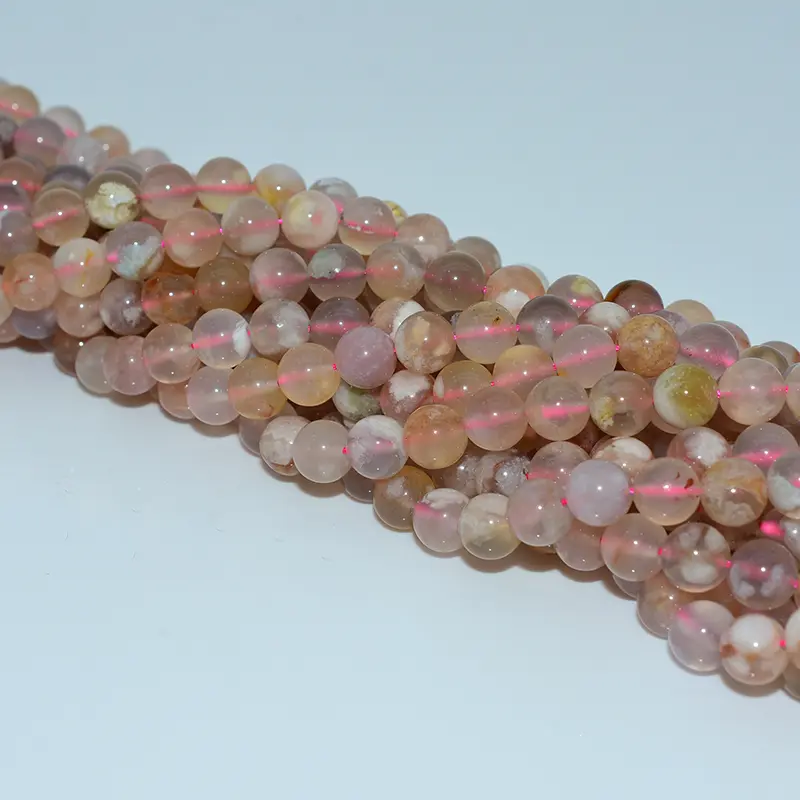 8mm round flower agate beads strand with soft pastel colors and polished surface, ideal for gemstone jewelry suppliers.